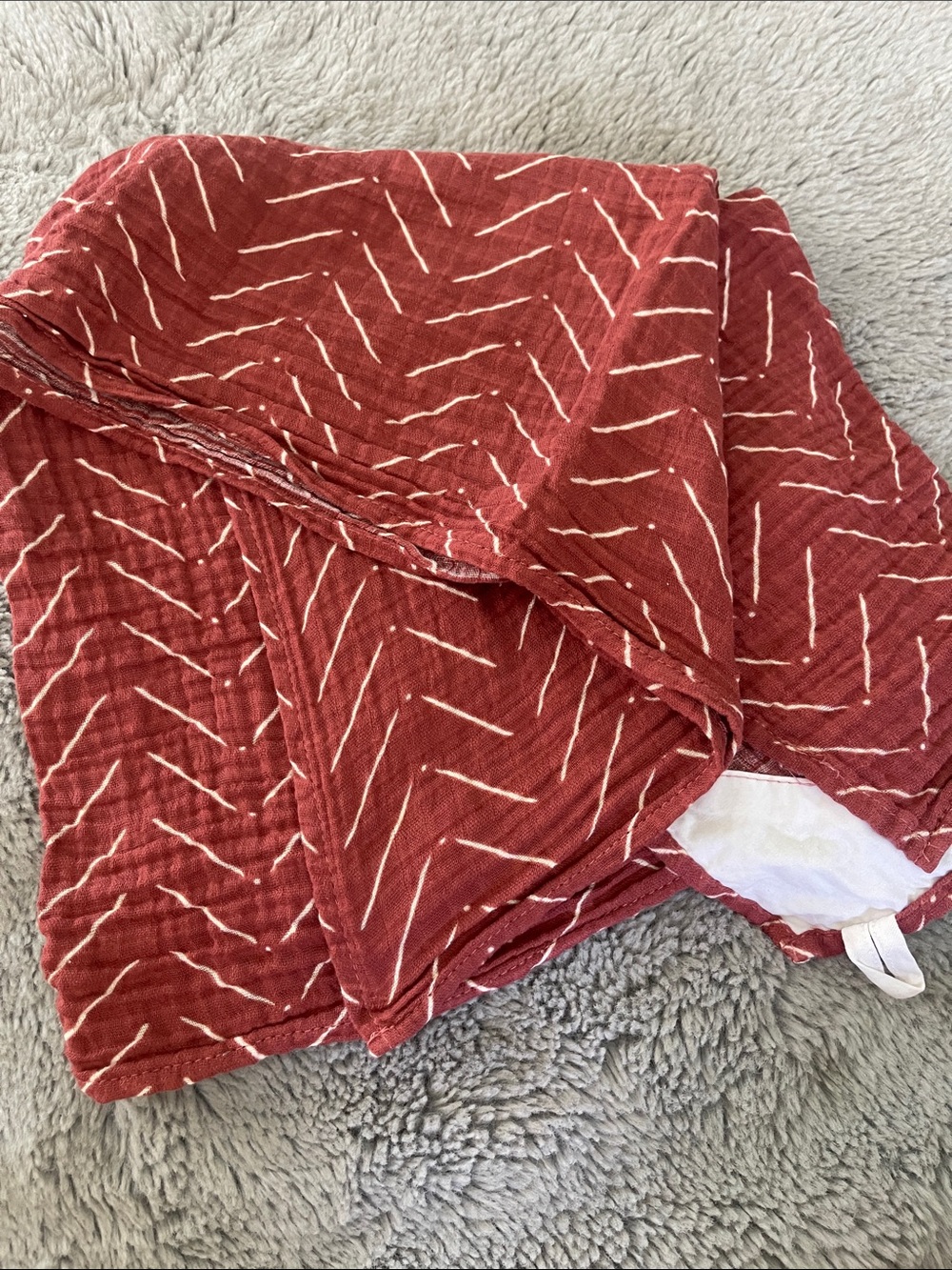 Itzy Ritzy Rust Rust Patterned Breastfeeding Boss Baby Swaddle Blanket